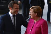 Макрон и Меркель обсудят Brexit с британским премьером