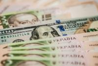 Официальный курс доллара упал до 25 гривен