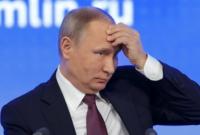 В Грузии возле здания парламента сожгли фото Путина В Грузии возле здания парламента сожгли фото Путина